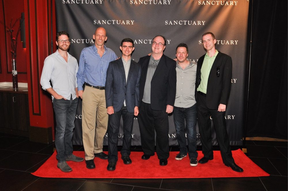 Six men on the red carpet at the Sanctuary premiere